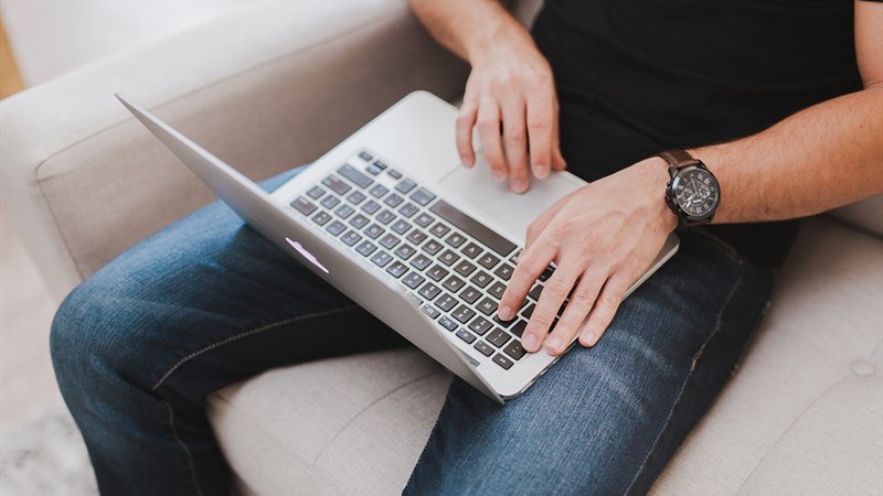 A Man Using Macbook