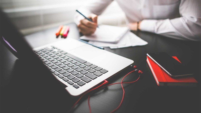 Entrepreneur Working on Macbook