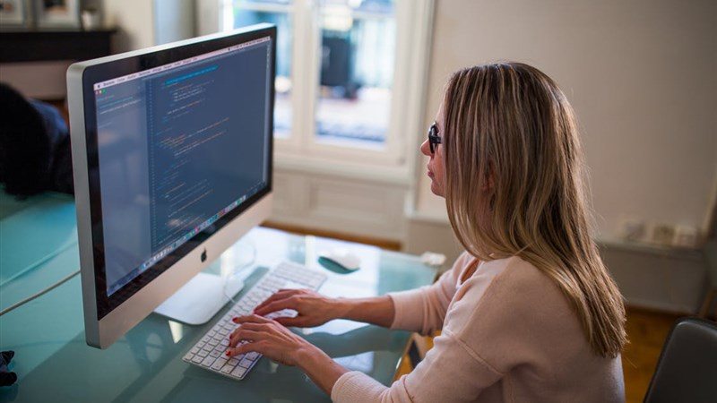 A Women Doing Computer Code