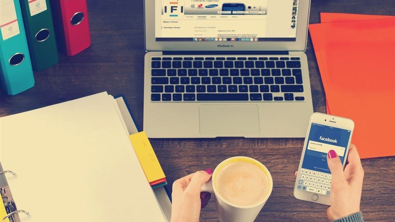 A Women Taking Tea at Workdesk