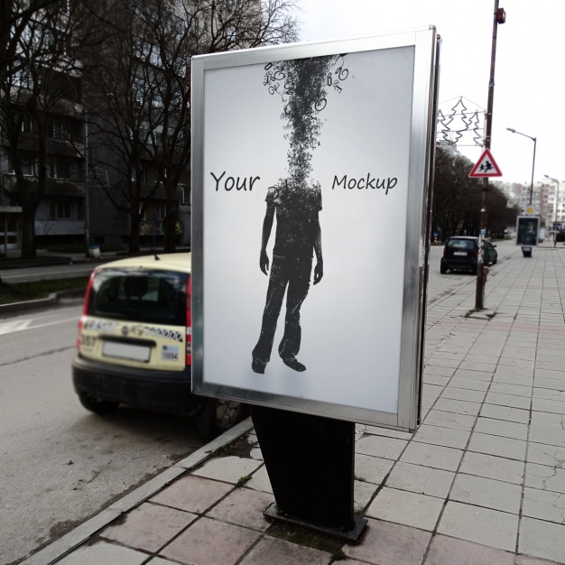 Poster displayed on street mockup