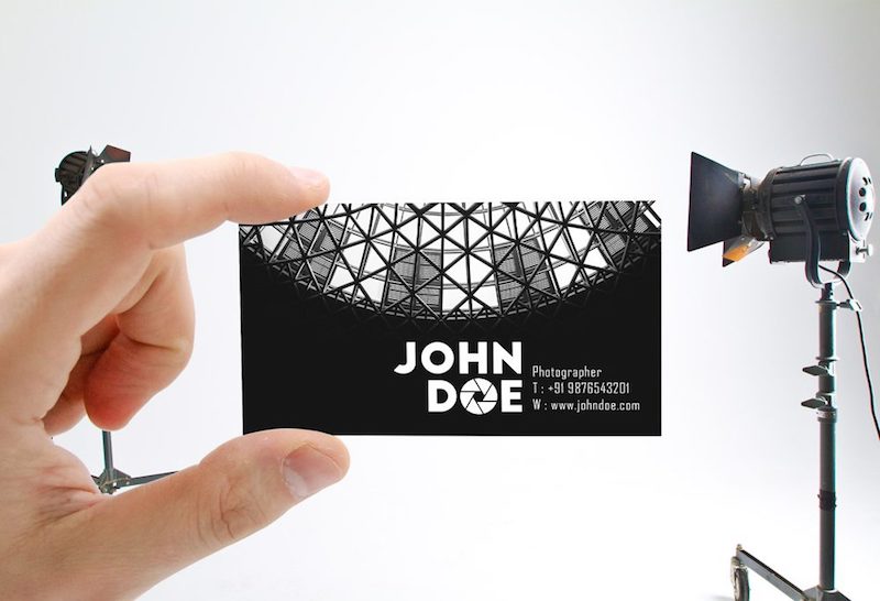 Free business card in hand mockup