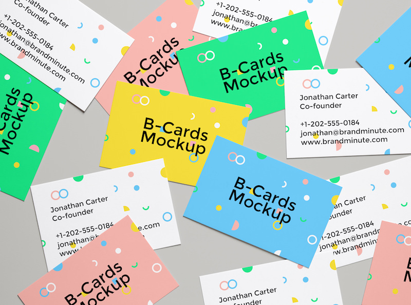 Business Cards scattered across mockup scene