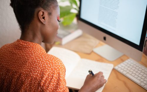 woman working on mac