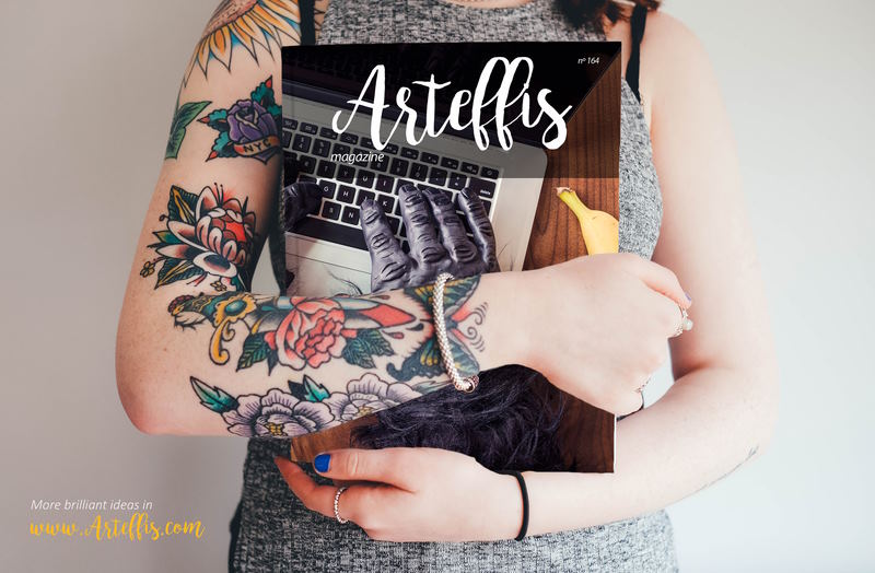 free tattooed woman holding magazine mockup